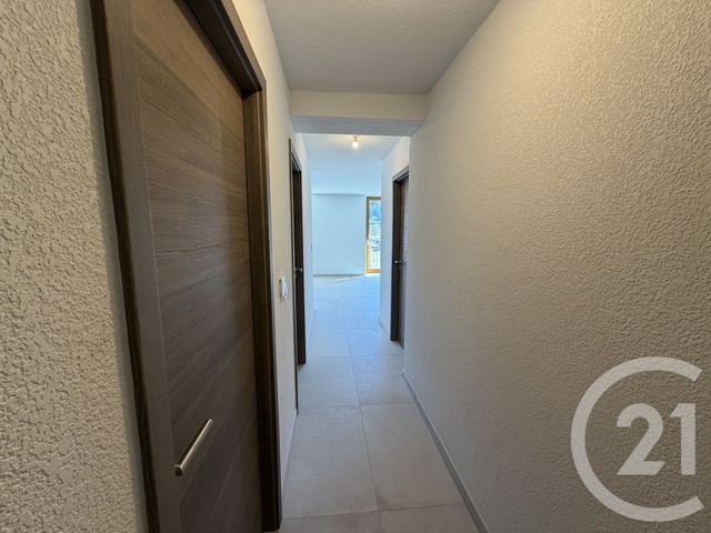 Appartement T3 à louer - 3 pièces - 51.06 m2 - TANINGES - 74 - RHONE-ALPES - Century 21 Vilminot Immobilier